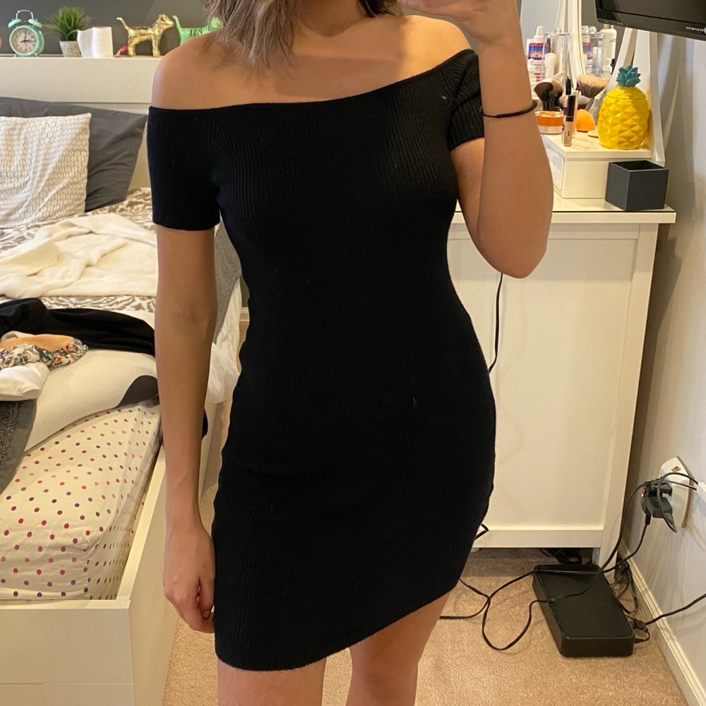 Off shoulder black knit mini dress